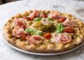 La pizzeria Flegrea festeggia 50 anni di storia a Torino tra tradizione napoletana e inclusività gluten-free